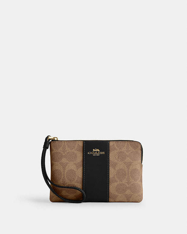 Coach Zip Wristlet In Signature Canvas With Black Stripe