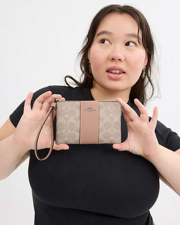 Coach Zip Wristlet In Signature Canvas With Beige Stripe