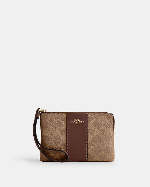 Coach Zip Wristlet In Signature Canvas With Brown Stripe