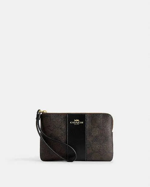 Coach Zip Wristlet In Signature Canvas With Black Stripe